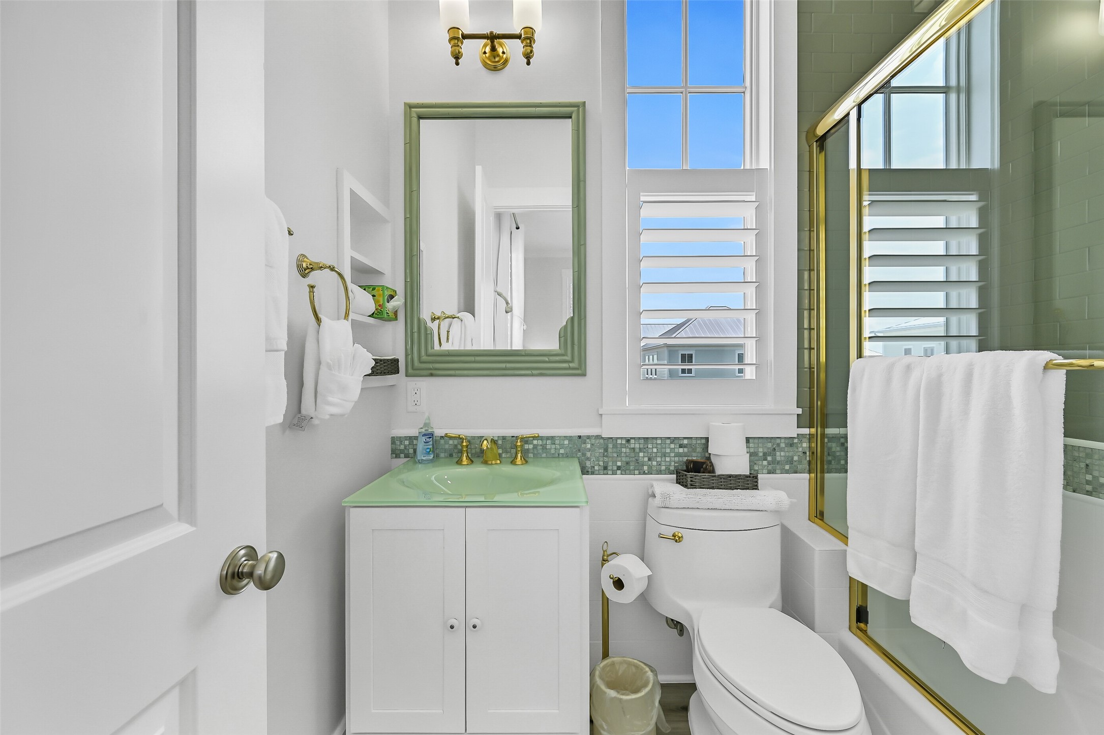 817 Positano Road Galveston, TX 77550 - Photo 38 of 50 This well-appointed ensuite bath features charming coastal accents, elegant fixtures, and a bright, airy design. Natural light and thoughtful finishes create a comfortable space for daily routines.