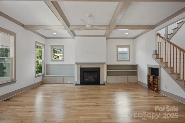 a spacious bathroom with a tub sink and mirror