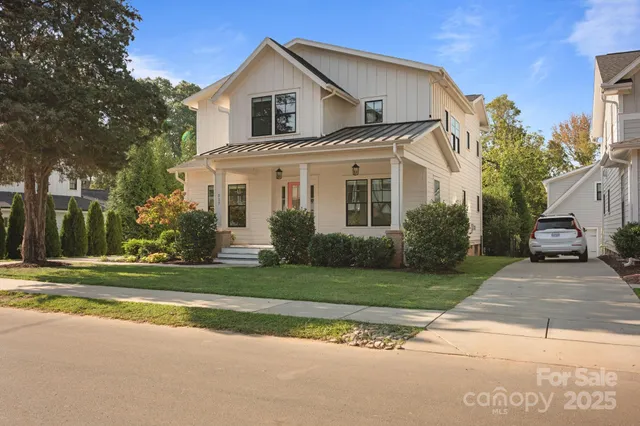 a kitchen with granite countertop a sink and cabinets