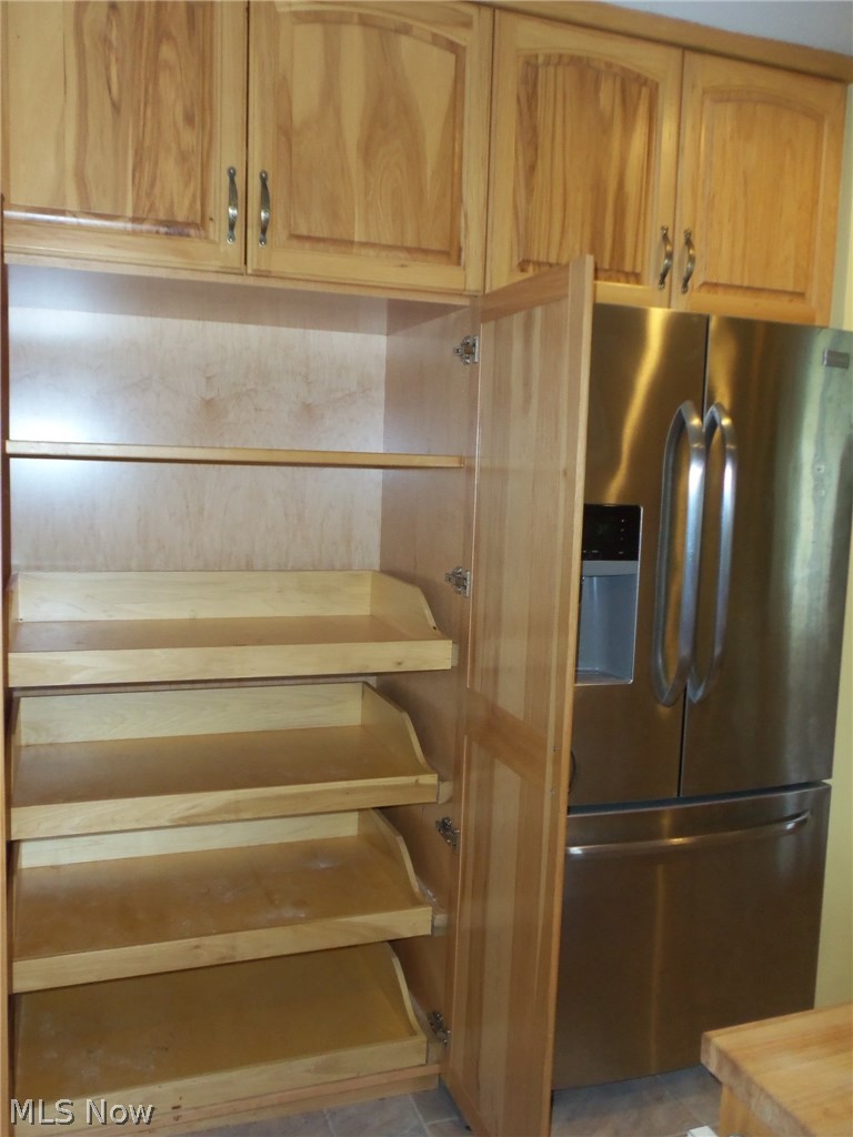 16850 Old State Road Middlefield, OH 44062 - Photo 11 of 23 Large pantry cupboard with convenient pull out shelves...