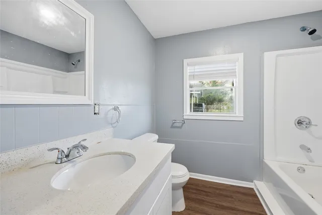 a bathroom with a sink and a tub