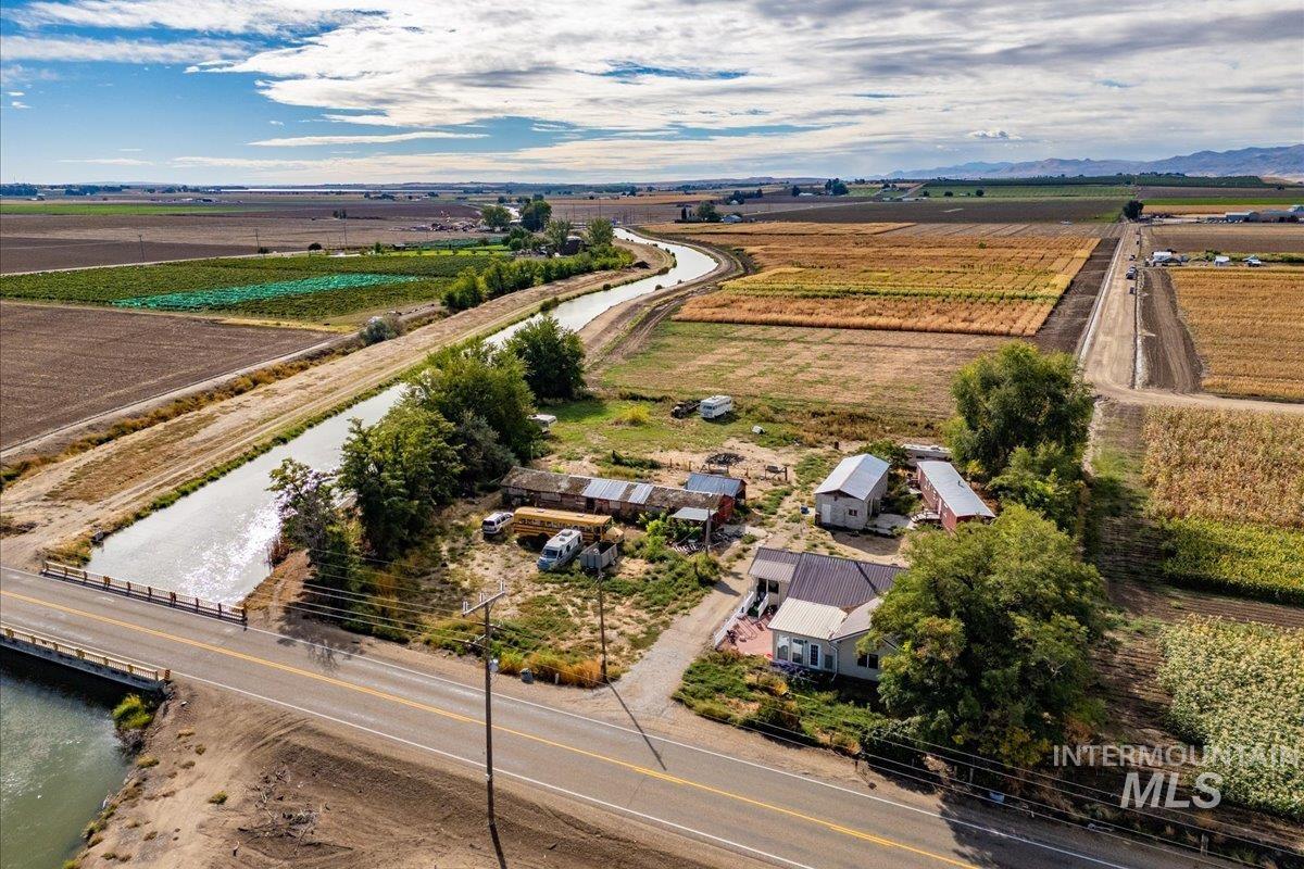 19241 West Homedale Road Caldwell, ID 83607 - Photo 5 of 35 Aerial view of sparsely populated area featuring rows of crops