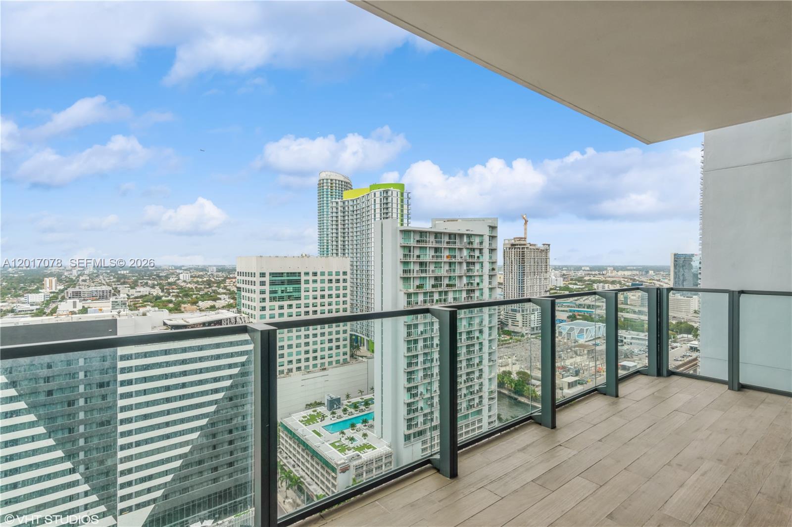 88 Southwest 7th Street, Unit 2508 Miami, FL 33130 - Photo 16 of 18 a view of a city from a balcony