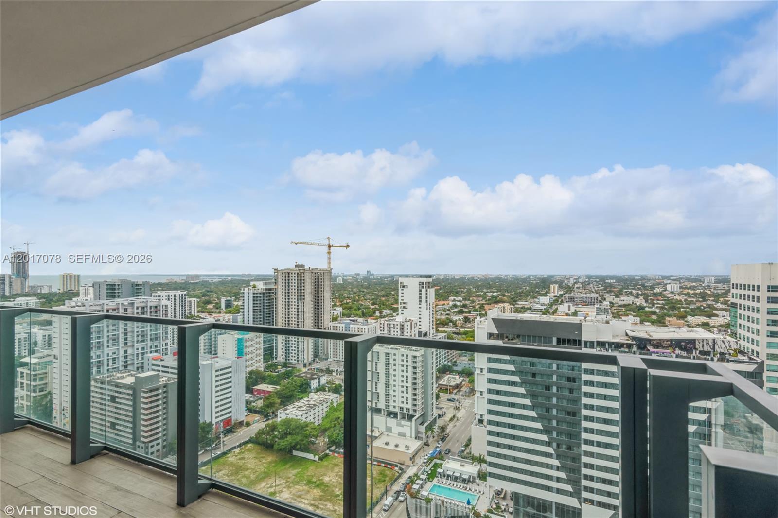 88 Southwest 7th Street, Unit 2508 Miami, FL 33130 - Photo 18 of 18 a view of a balcony with city view