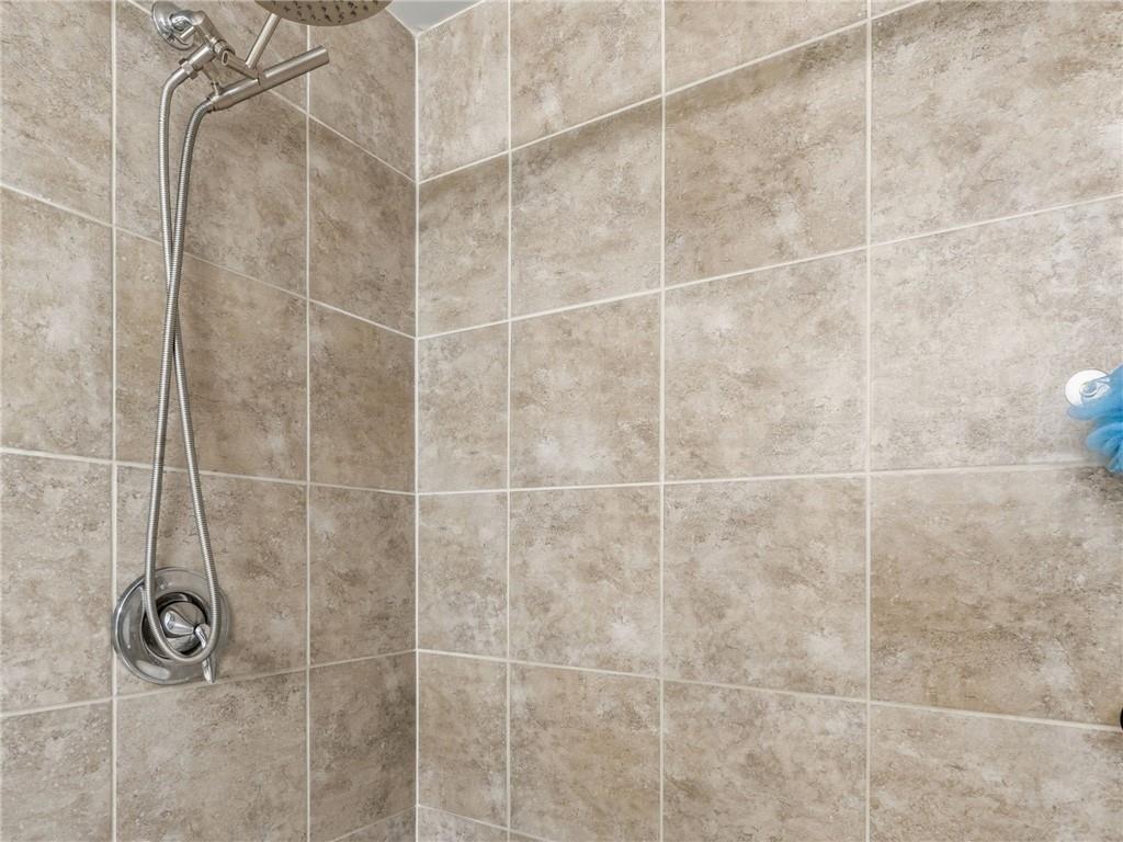 147 Fieldbrook Crossing Canton, GA 30115 - Photo 24 of 46 a bathroom with a shower