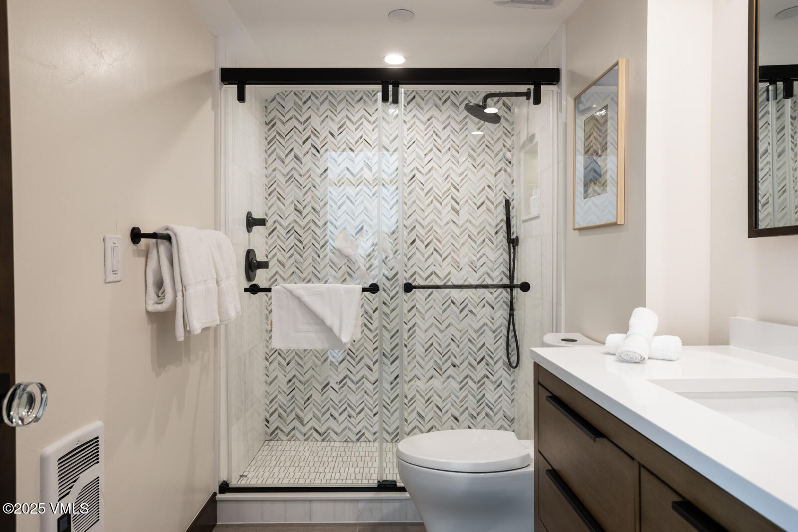 120 Offerson Road, Unit 3430 Beaver Creek, CO 81620 - Photo 20 of 36 a bathroom with a granite countertop sink toilet and shower