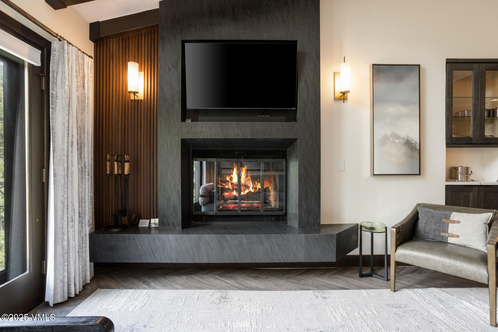 120 Offerson Road, Unit 3430 Beaver Creek, CO 81620 - Photo 2 of 36 a living room with furniture and a fireplace