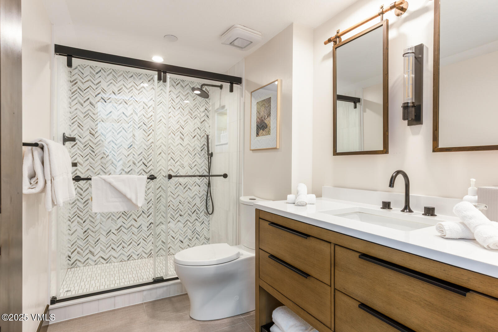 120 Offerson Road, Unit 3430 Beaver Creek, CO 81620 - Photo 21 of 36 a bathroom with a sink and a mirror