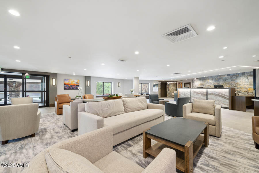 120 Offerson Road, Unit 3430 Beaver Creek, CO 81620 - Photo 30 of 36 a living room with furniture and a large window