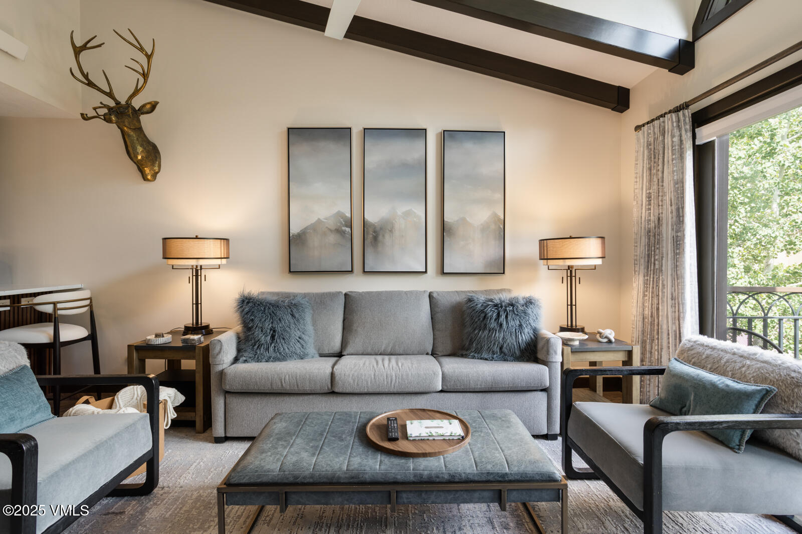 120 Offerson Road, Unit 3430 Beaver Creek, CO 81620 - Photo 4 of 36 a living room with furniture and a large window