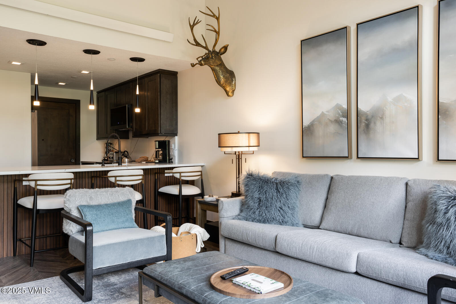 120 Offerson Road, Unit 3430 Beaver Creek, CO 81620 - Photo 6 of 36 a living room with furniture kitchen and a chandelier