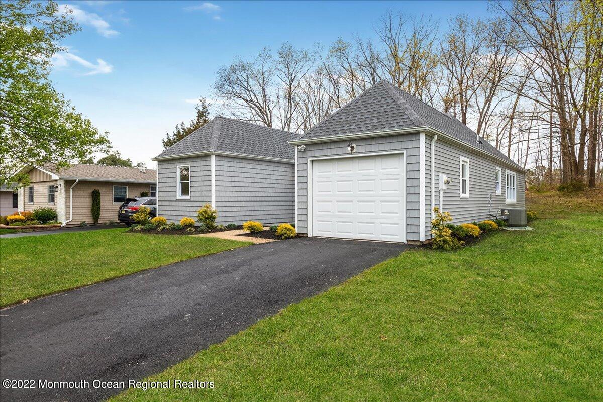 2 Bryant Road Brick, NJ 08724 - Photo 3 of 28 a front view of house with yard and green space