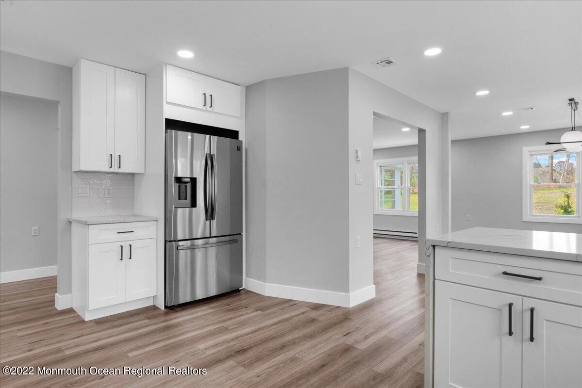 2 Bryant Road Brick, NJ 08724 - Photo 10 of 28 a kitchen with stainless steel appliances granite countertop a refrigerator and a sink