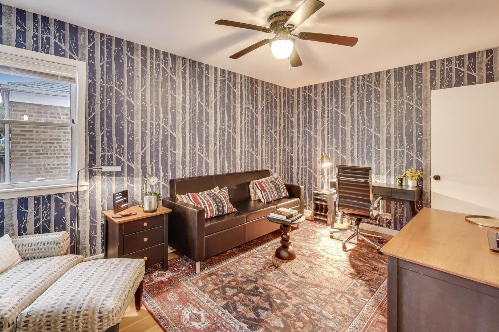 235 Richmond Street Evanston, IL 60202 - Photo 11 of 38 a living room with furniture and a large window