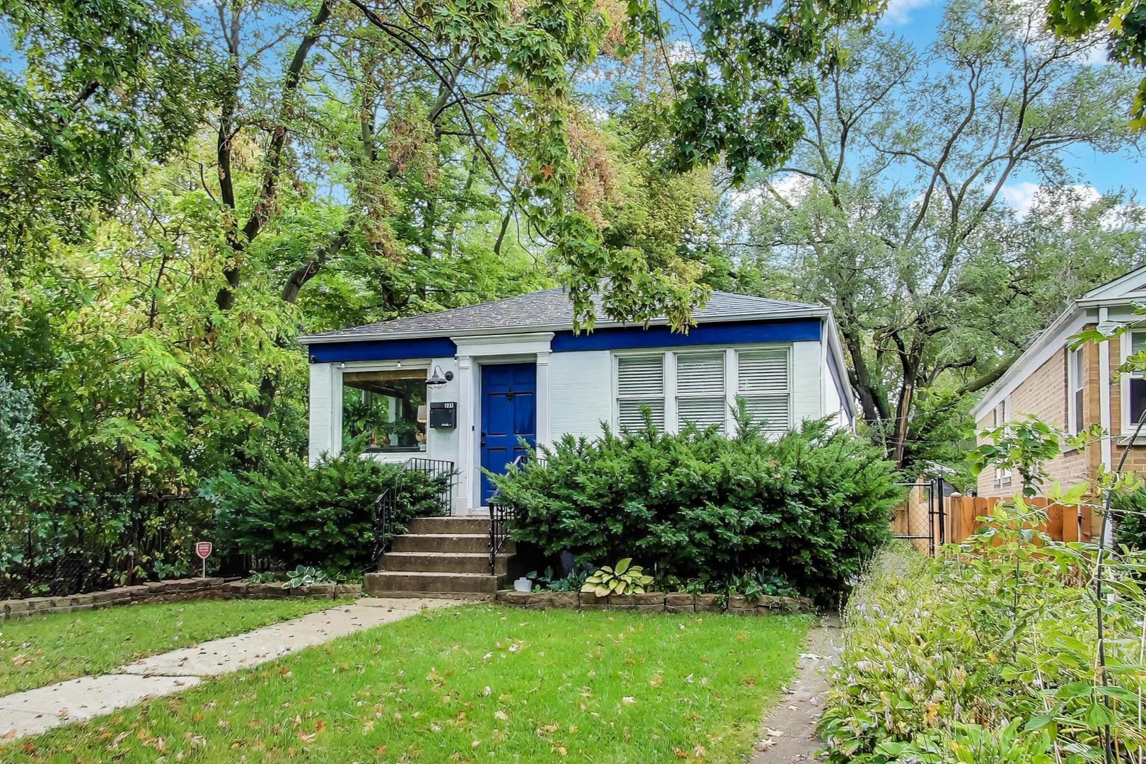 235 Richmond Street Evanston, IL 60202 - Photo 2 of 38 a view of a house with a yard and plants