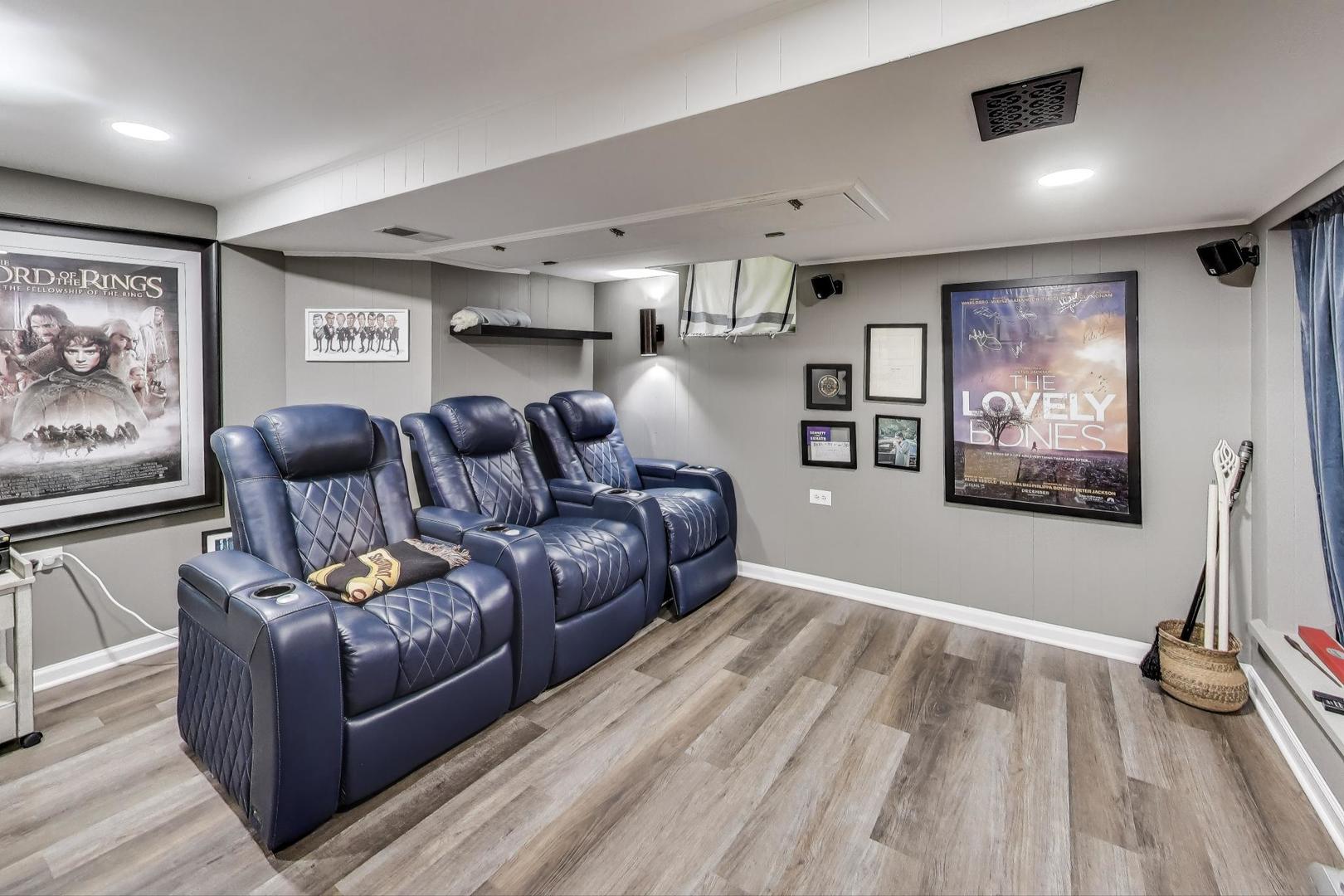 235 Richmond Street Evanston, IL 60202 - Photo 27 of 38 a living room with furniture and a flat screen tv