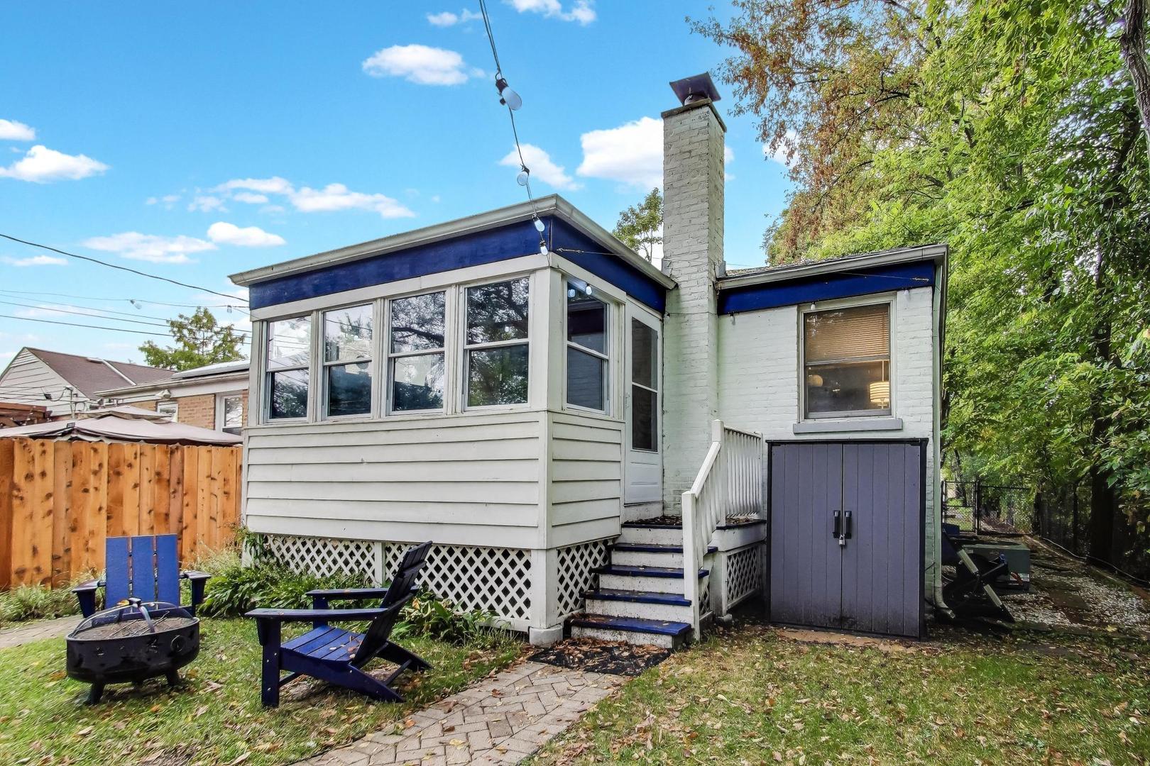 235 Richmond Street Evanston, IL 60202 - Photo 30 of 38 a front view of a house with garden