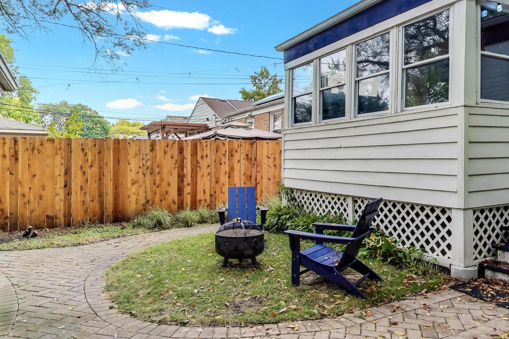 235 Richmond Street Evanston, IL 60202 - Photo 35 of 38 a view of a backyard with sitting area