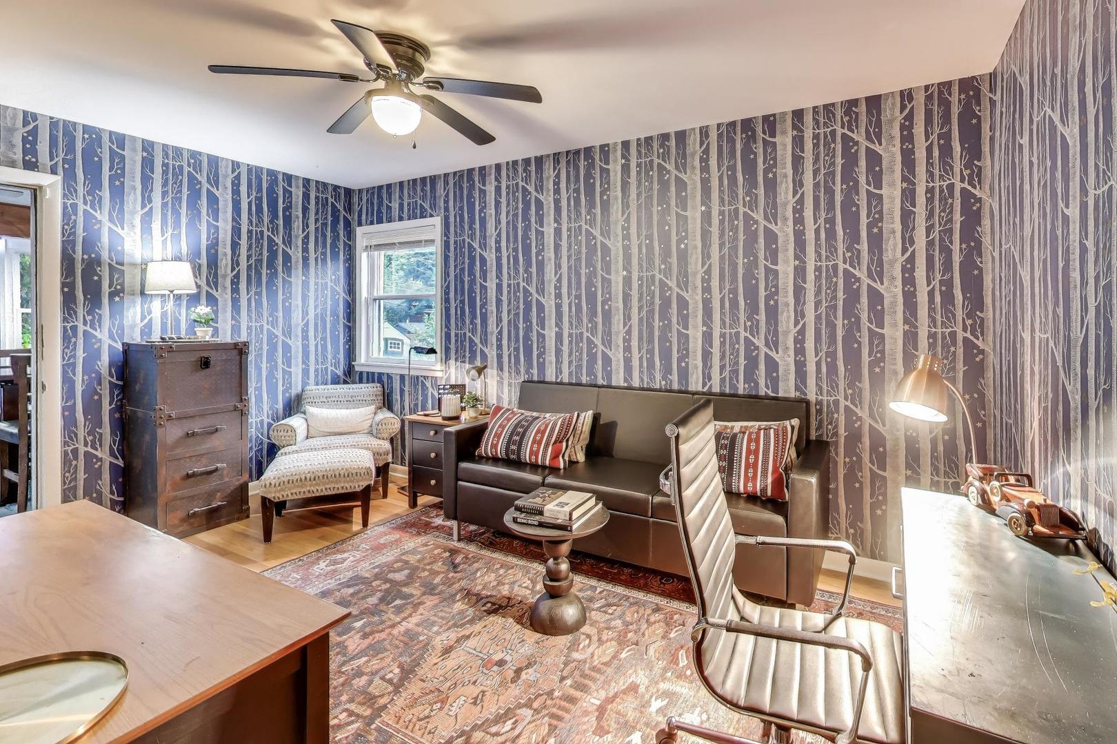 235 Richmond Street Evanston, IL 60202 - Photo 9 of 38 a living room with furniture and wooden floor