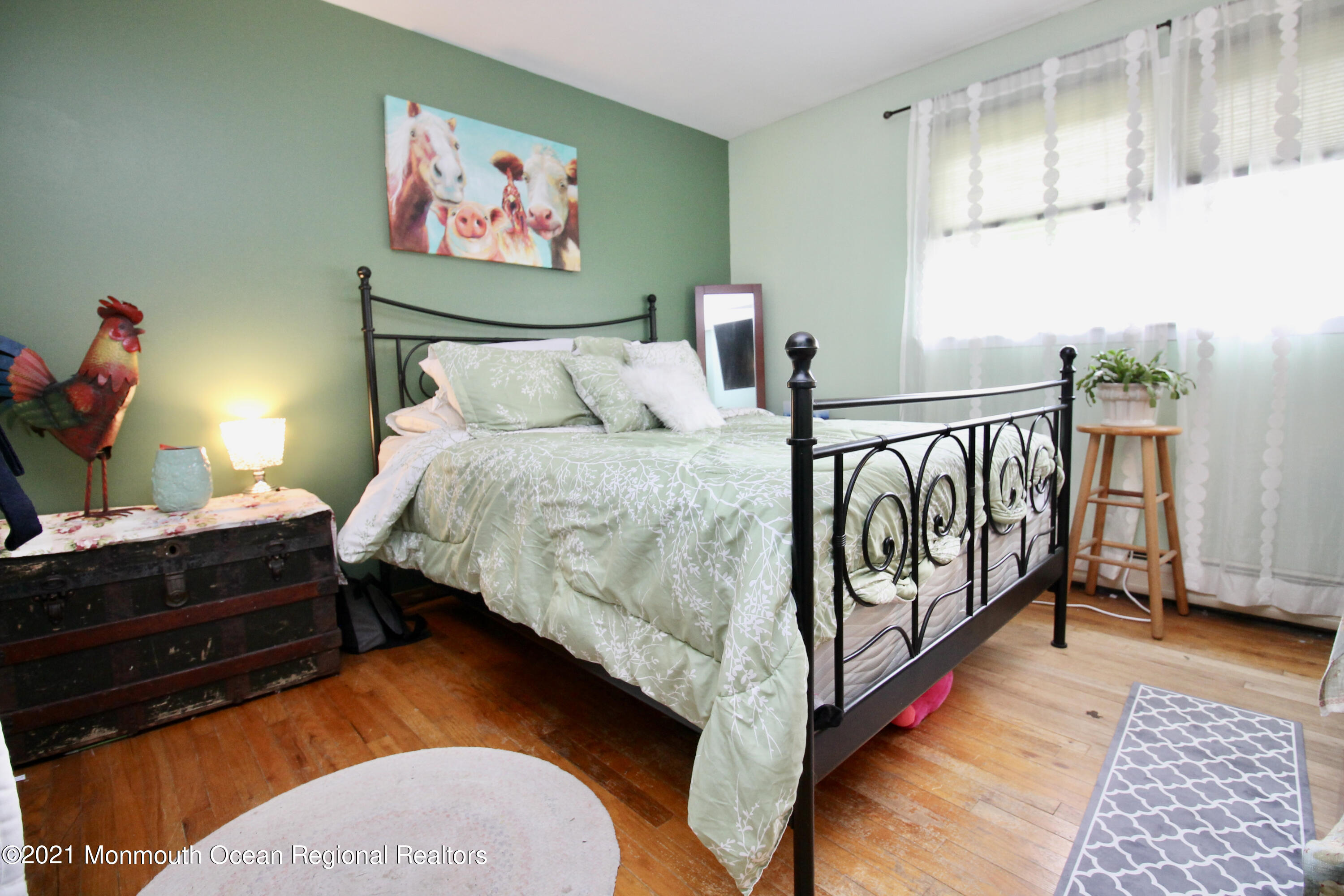 866 Monmouth Road Cream Ridge, NJ 08514 - Photo 23 of 39 a bedroom with bed cabinet and a window