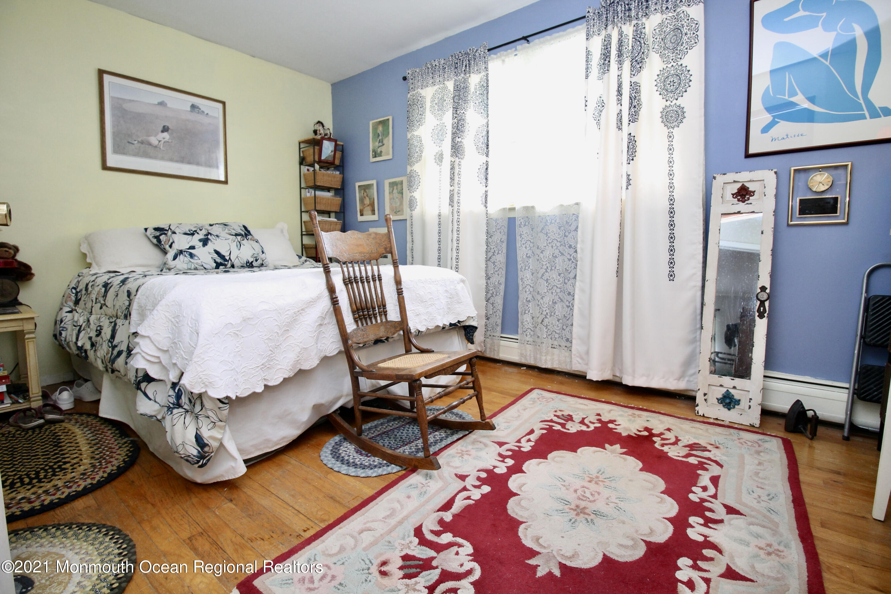 866 Monmouth Road Cream Ridge, NJ 08514 - Photo 24 of 39 a living room with furniture and a rug