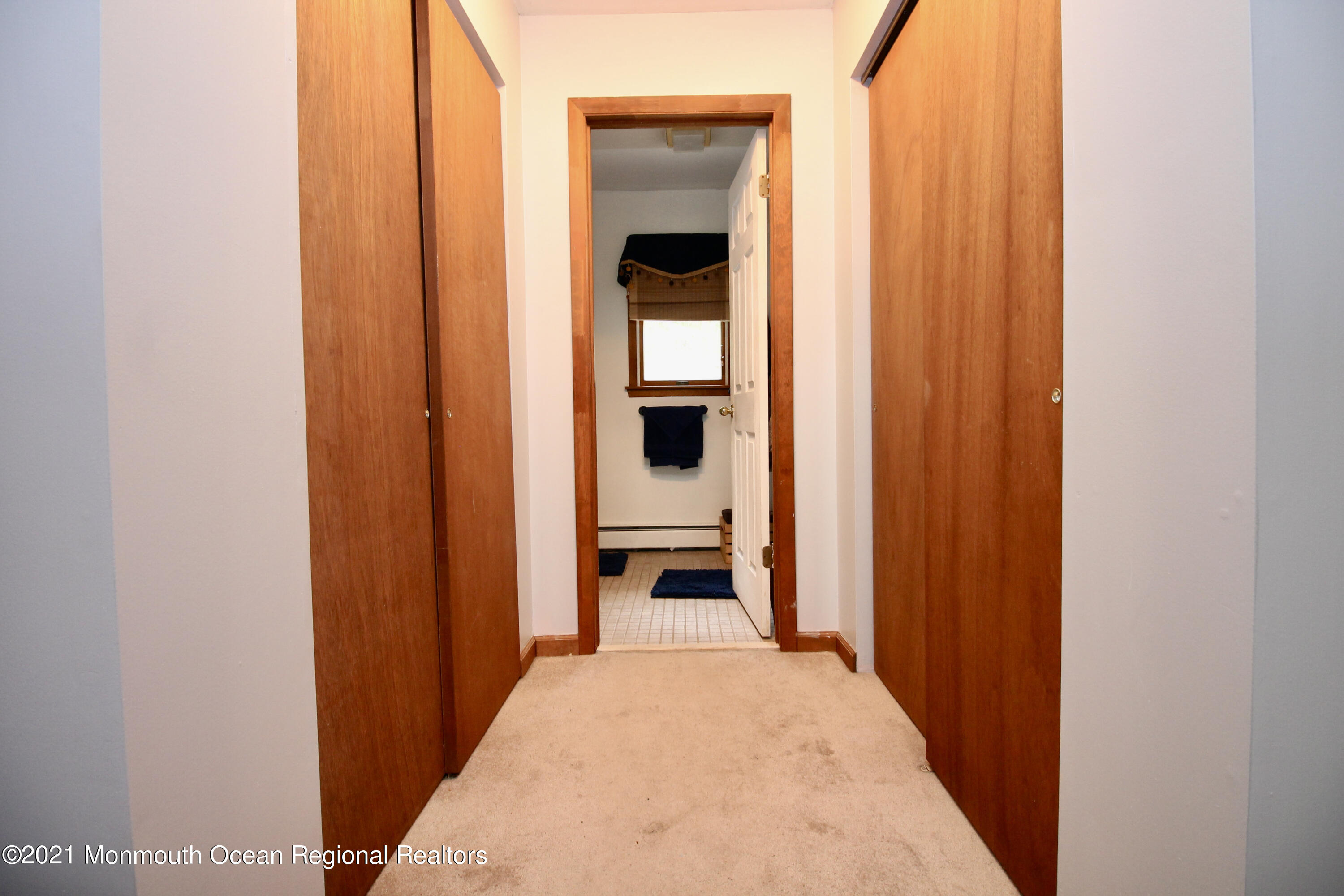 866 Monmouth Road Cream Ridge, NJ 08514 - Photo 27 of 39 a hallway with wooden floor an entryway