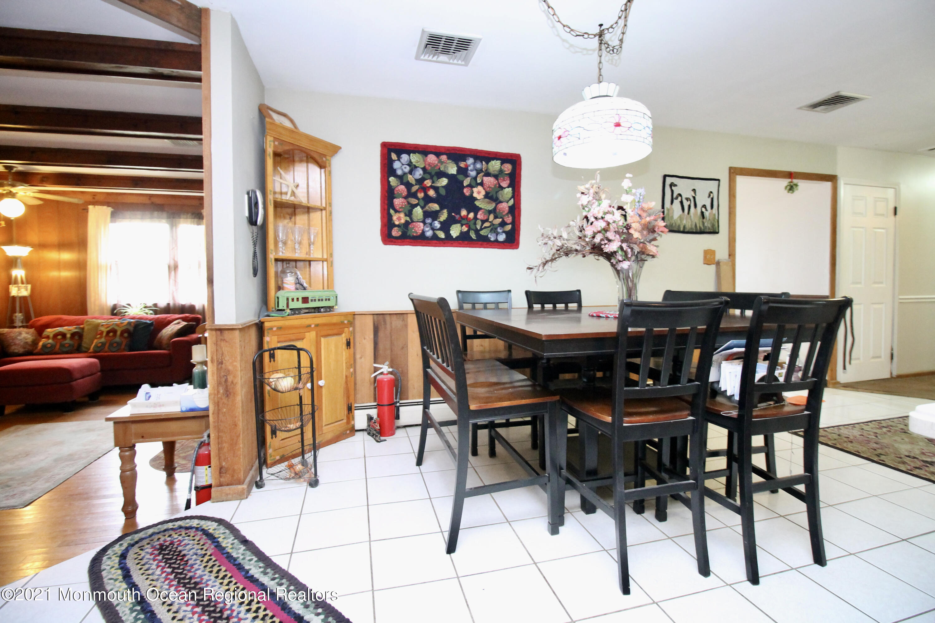 866 Monmouth Road Cream Ridge, NJ 08514 - Photo 10 of 39 a view of a dining room and hall with furniture