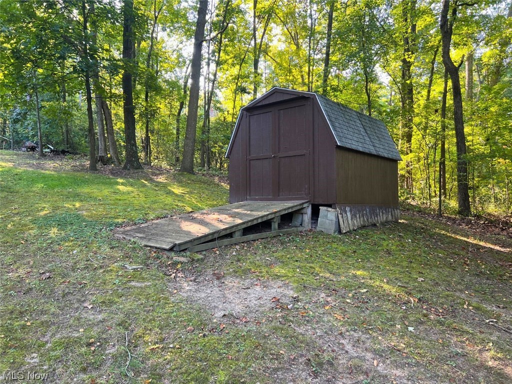 282 Magnolia Road Northwest Dellroy, OH 44620 - Photo 6 of 27 View of outdoor structure with a storage shed
