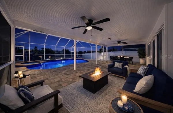a large kitchen with cabinets and wooden floor