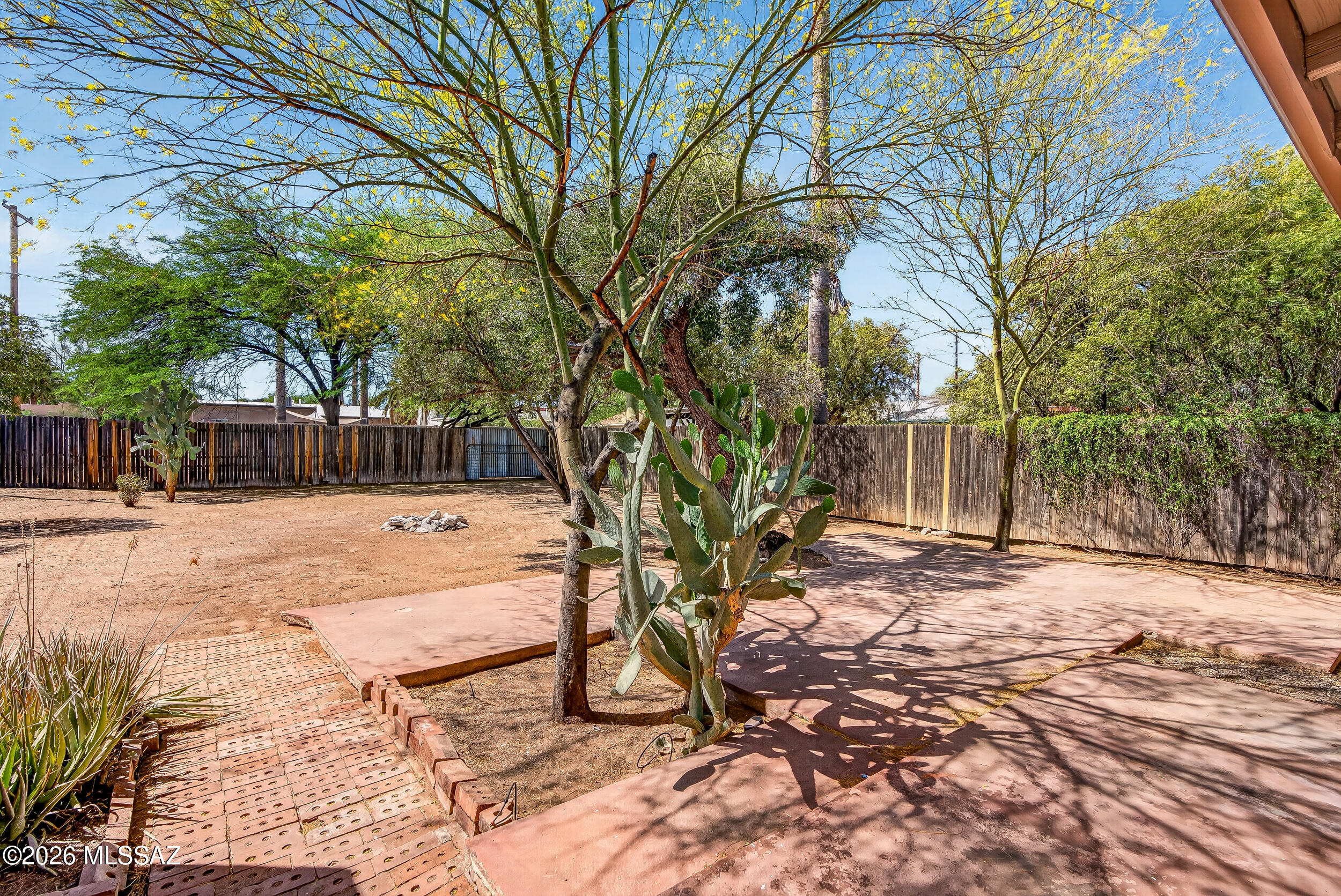 1412 East Spring Street Tucson, AZ 85719 - Photo 34 of 43 a view of house with backyard and tree