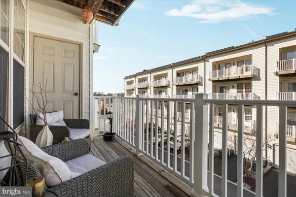 a balcony with wooden floor