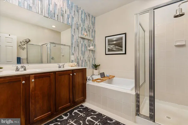 a bathroom with a sink and a shower