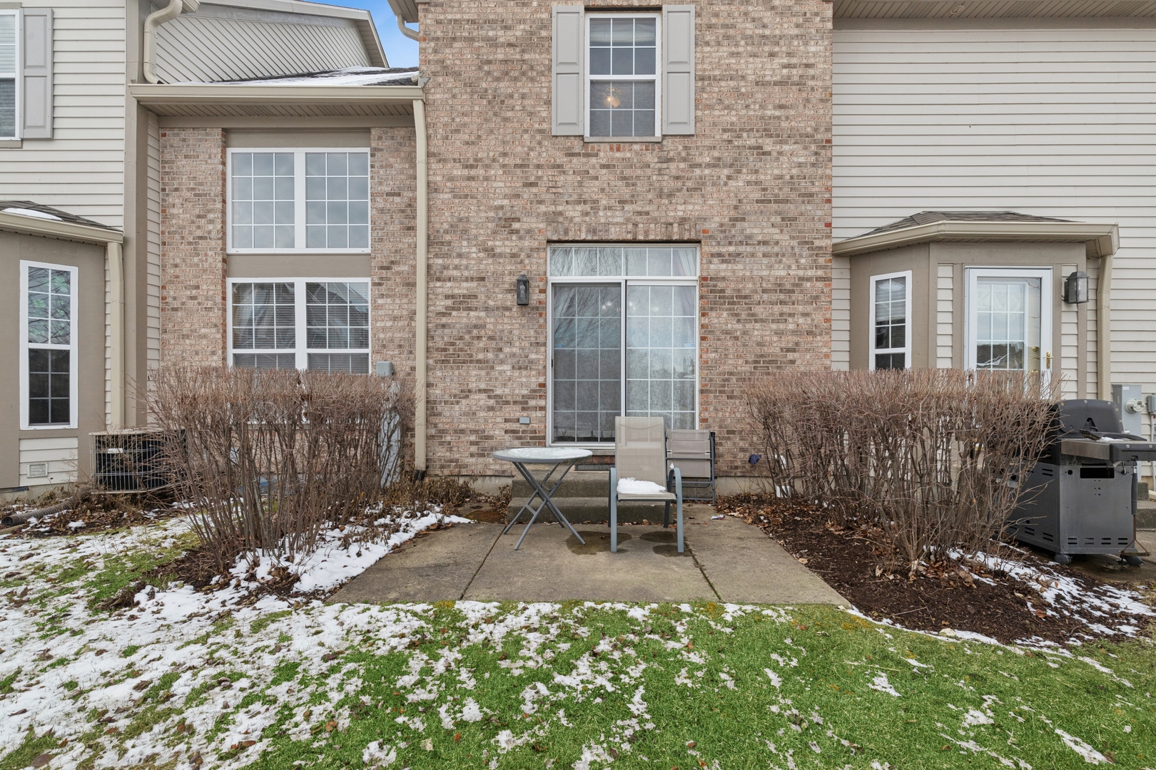 2014 Ivy Ridge Drive Hoffman Estates, IL 60192 - Photo 2 of 14 a backyard of a house with outdoor seating