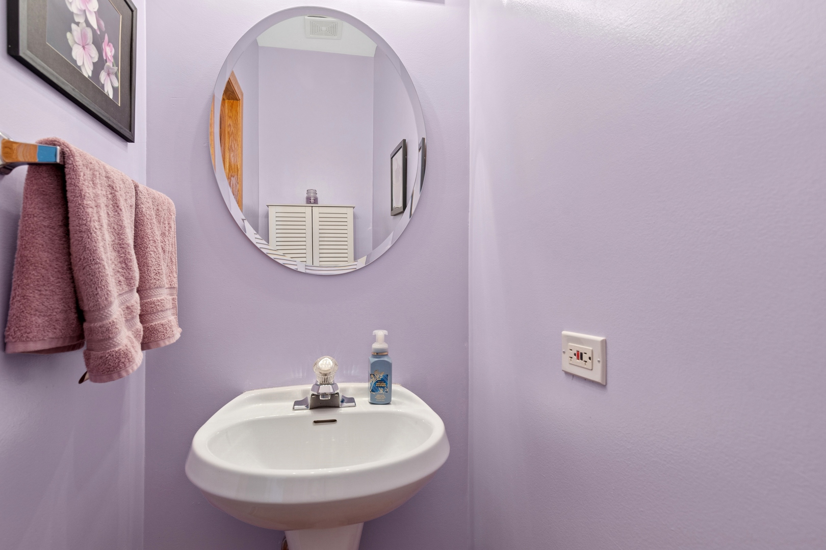 2014 Ivy Ridge Drive Hoffman Estates, IL 60192 - Photo 6 of 14 a bathroom with a sink and a mirror