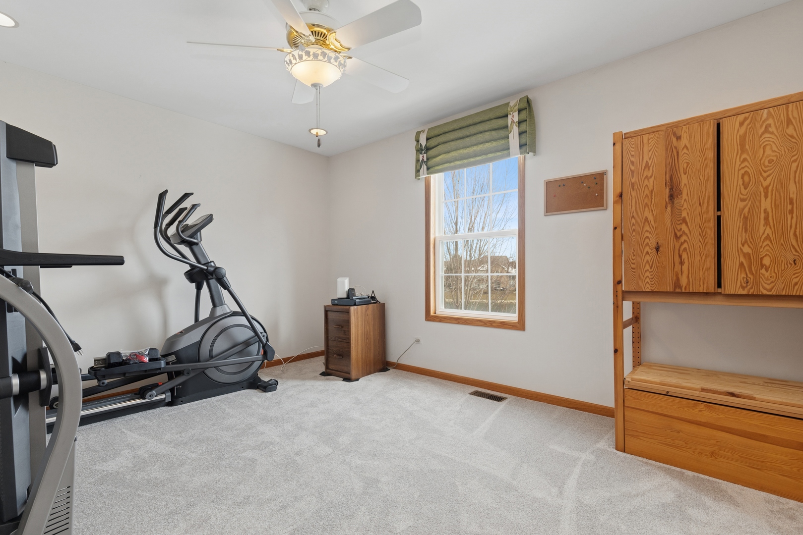 2014 Ivy Ridge Drive Hoffman Estates, IL 60192 - Photo 9 of 14 a view of a room with gym equipment