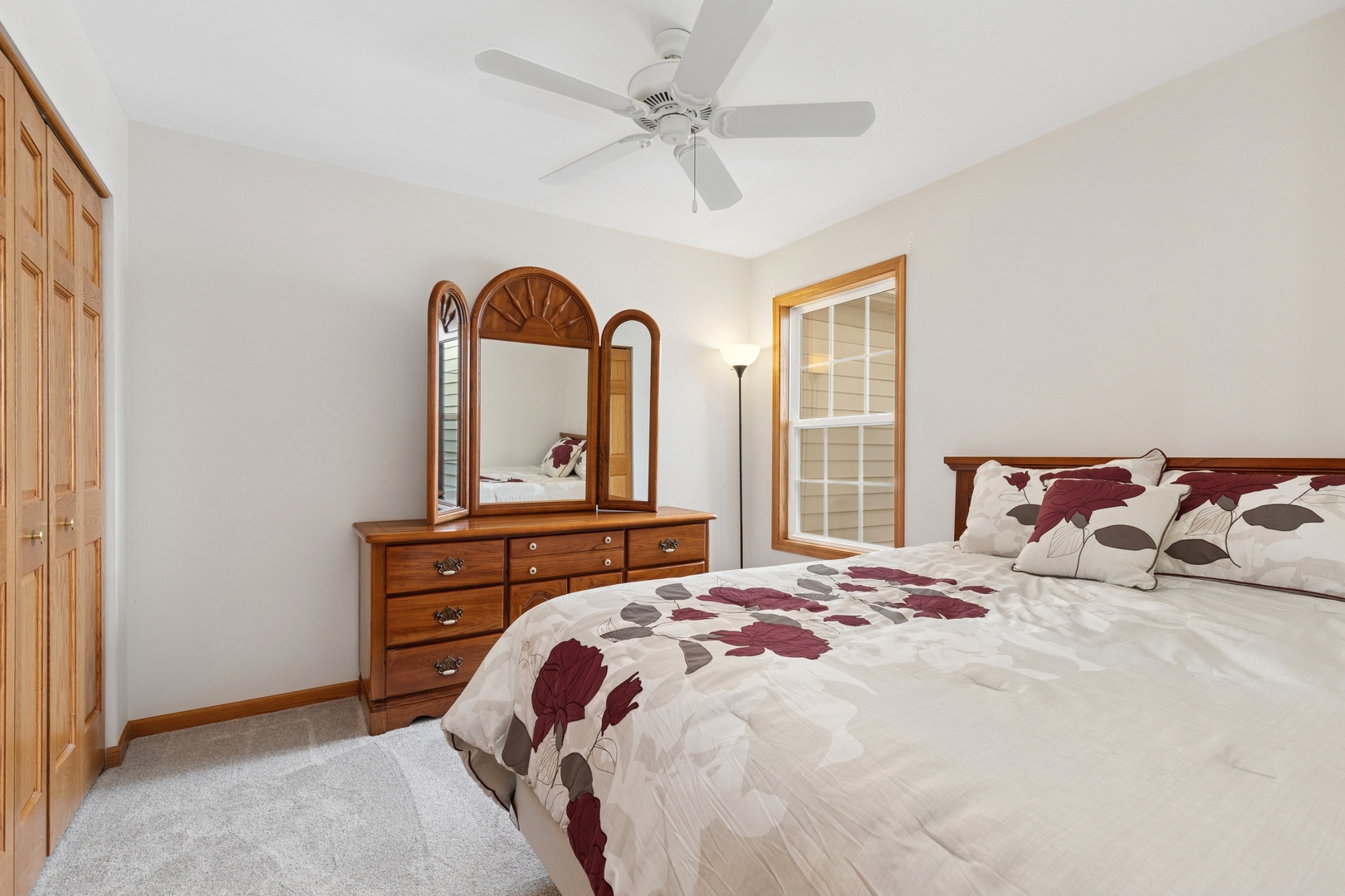 2014 Ivy Ridge Drive Hoffman Estates, IL 60192 - Photo 10 of 14 a bedroom with a bed and a dresser