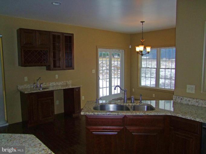 5631 Long Corner Road White Hall, MD 21161 - Photo 19 of 22 Kitchen and Sunroom