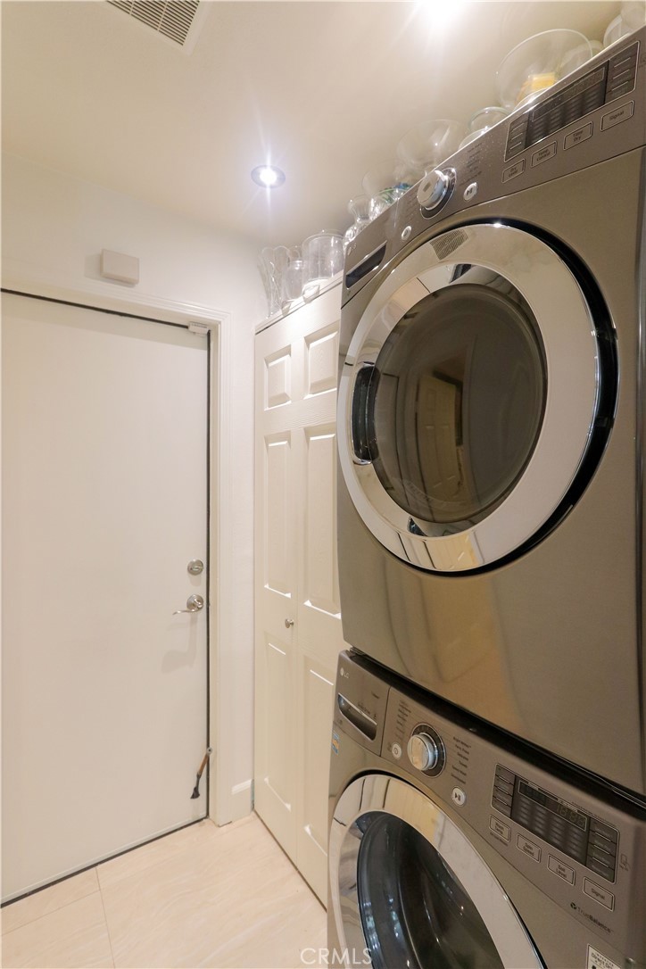 8 Sandpiper Irvine, CA 92604 - Photo 23 of 45 a utility room with dryer and washer