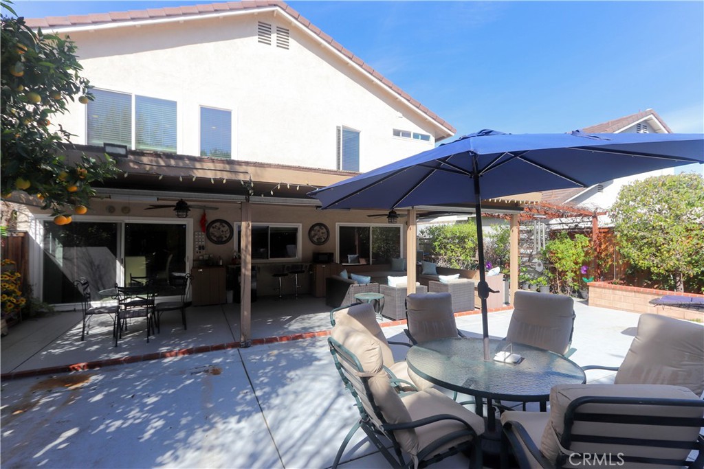 8 Sandpiper Irvine, CA 92604 - Photo 38 of 45 a view of a house with backyard sitting area and furniture