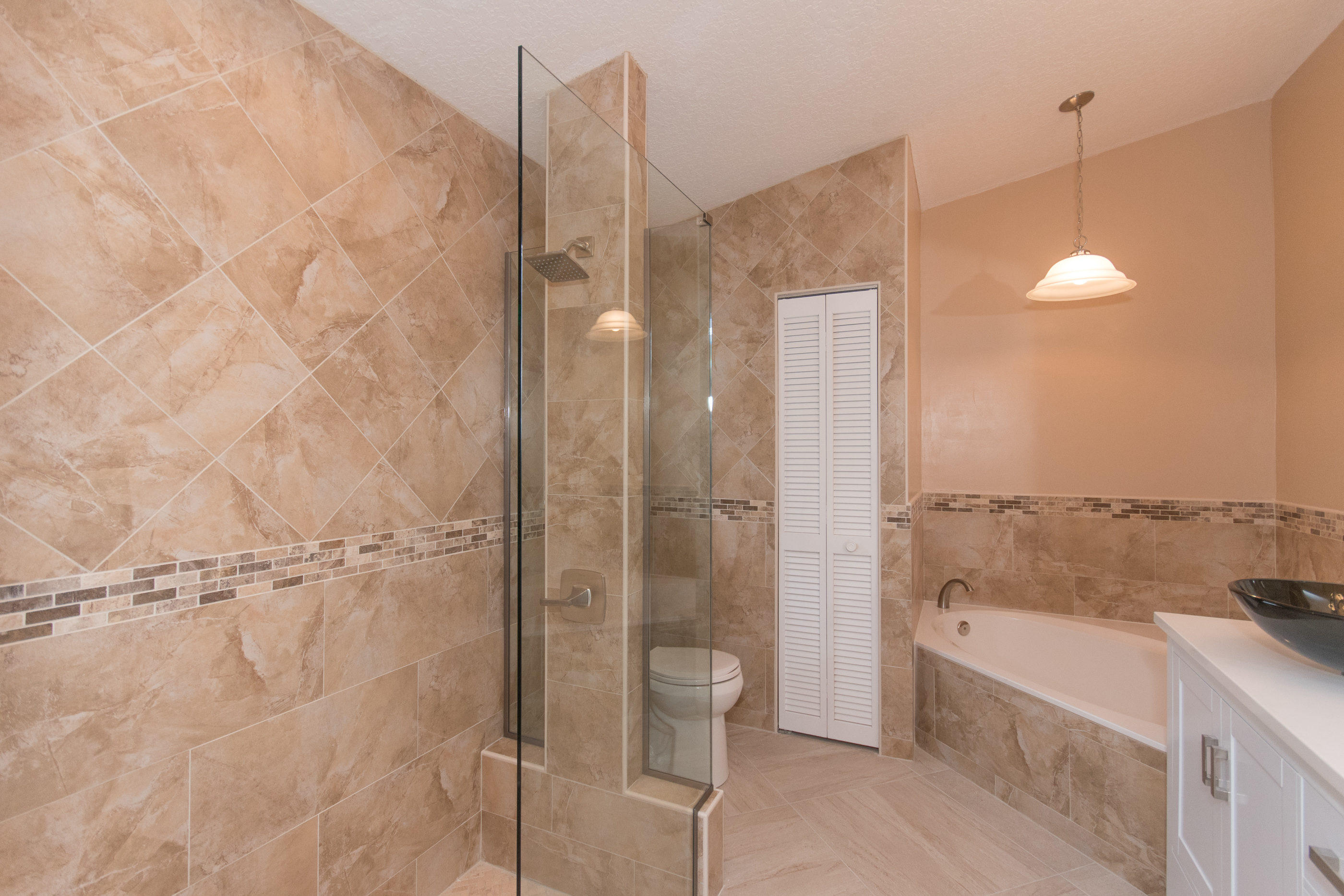 6196 Adams Street Jupiter, FL 33458 - Photo 13 of 26 Master Bathroom