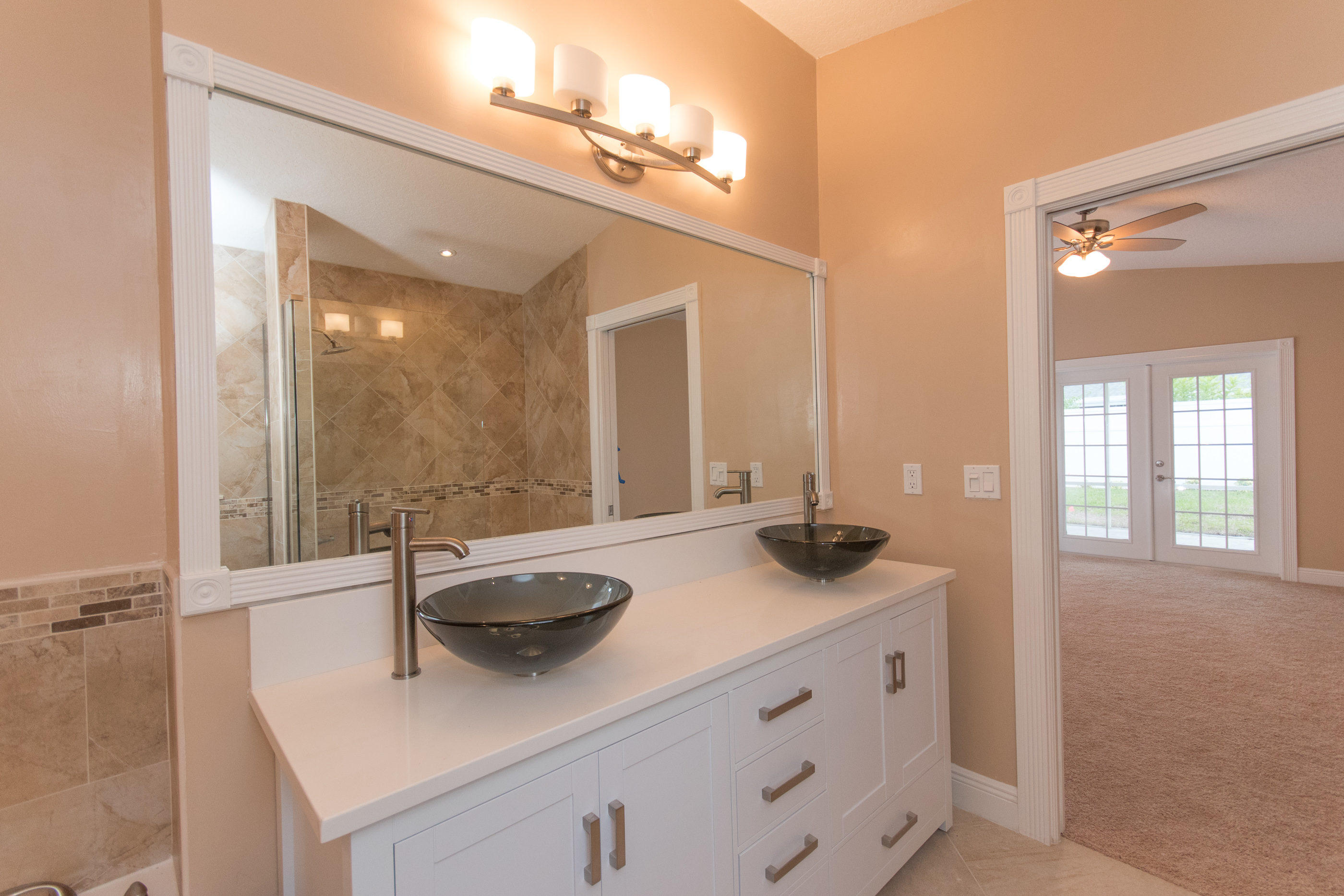6196 Adams Street Jupiter, FL 33458 - Photo 15 of 26 Master Bathroom