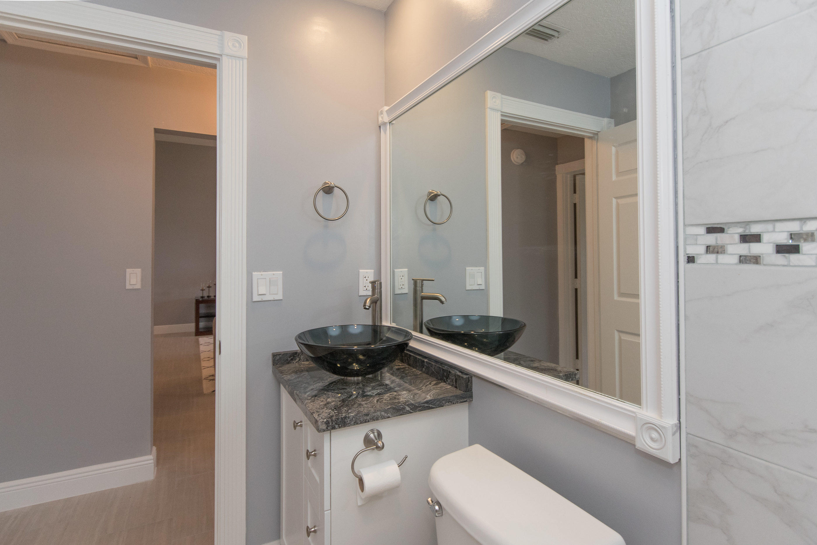 6196 Adams Street Jupiter, FL 33458 - Photo 20 of 26 Guest Bathroom
