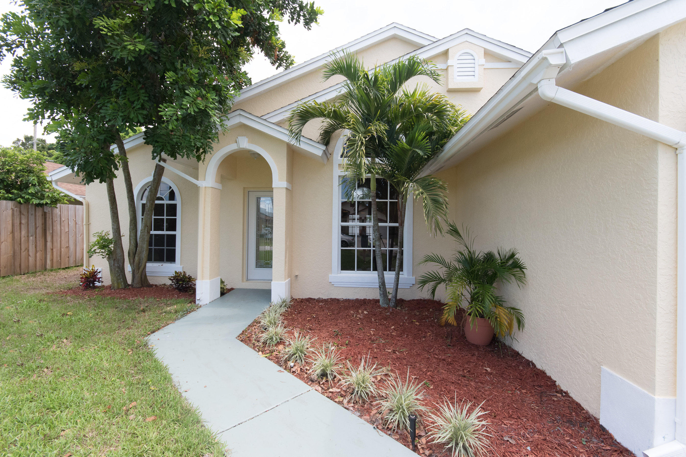 6196 Adams Street Jupiter, FL 33458 - Photo 2 of 26 Front Entrance