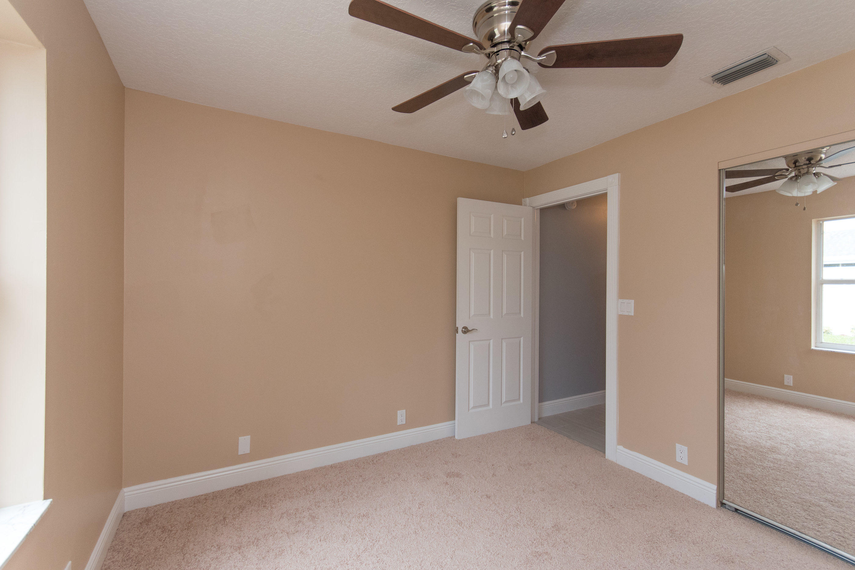 6196 Adams Street Jupiter, FL 33458 - Photo 21 of 26 Guest Bedroom