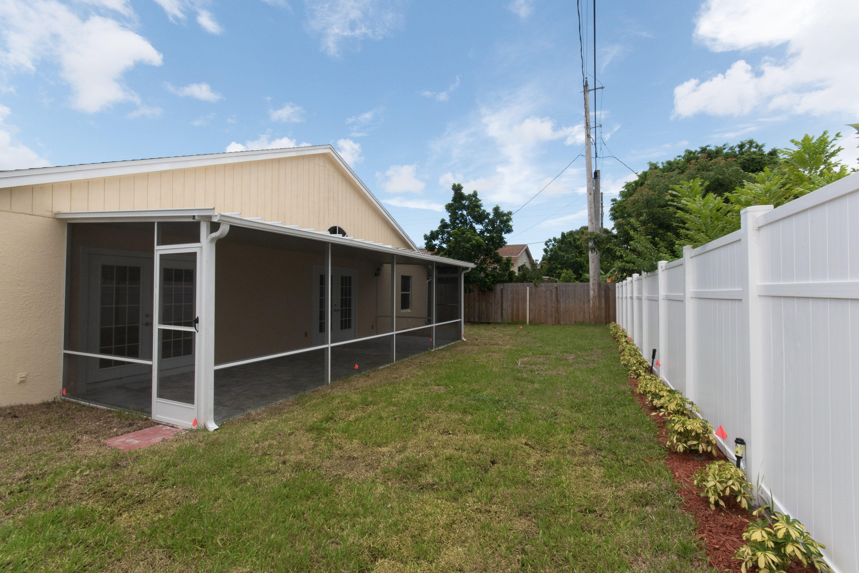 6196 Adams Street Jupiter, FL 33458 - Photo 23 of 26 Screened Enclosure