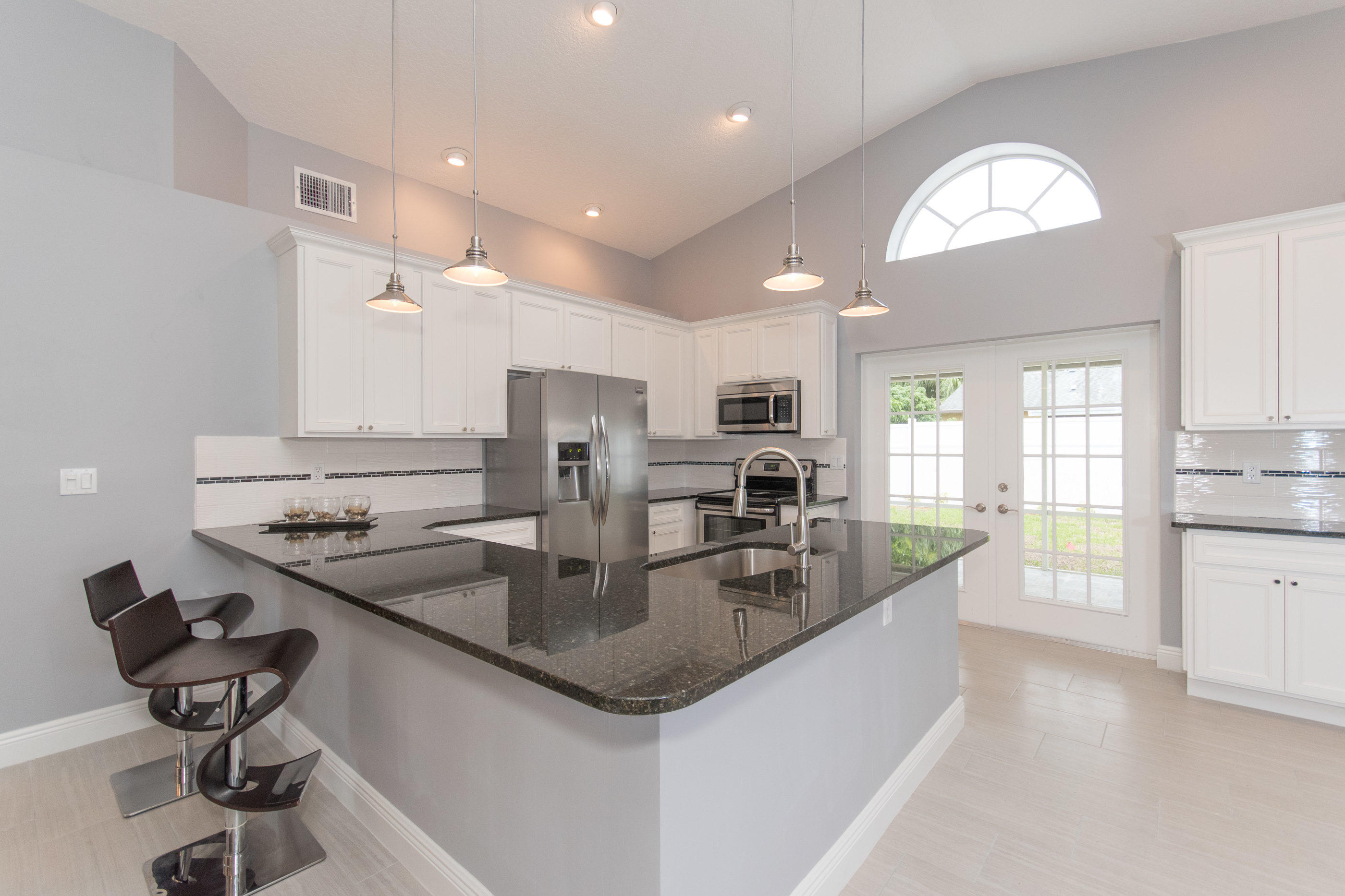 6196 Adams Street Jupiter, FL 33458 - Photo 6 of 26 Kitchen