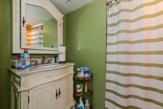a utility room with a sink dryer and washer