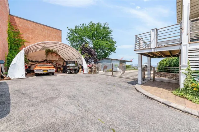 a view of a car parked in front of a building