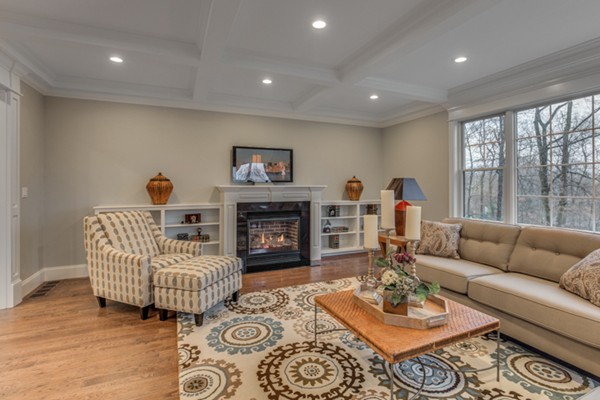 39 Lorena Road Winchester, MA 01890 - Photo 16 of 30 a living room with furniture and a fireplace