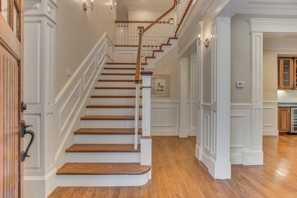 39 Lorena Road Winchester, MA 01890 - Photo 2 of 30 a view of entryway with wooden floor and stairs
